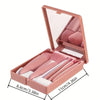 Makeup brush set with a compact case on a white background
